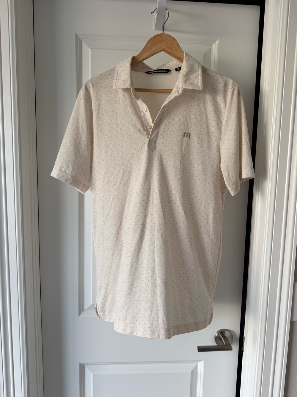 Travis Mathew Light Cream Polo with Micro Dot Detail